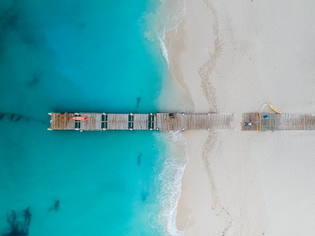 crystal clear ocean water and white sand beach