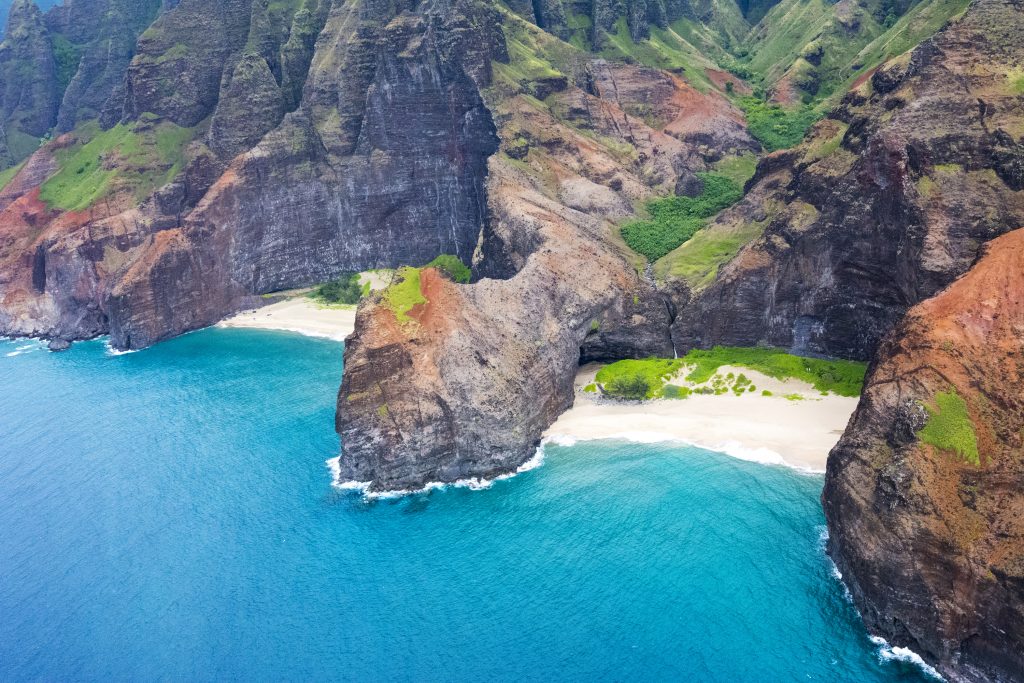 The Na Pali Coast in Hawaii is famed for its white sand beaches and clear water